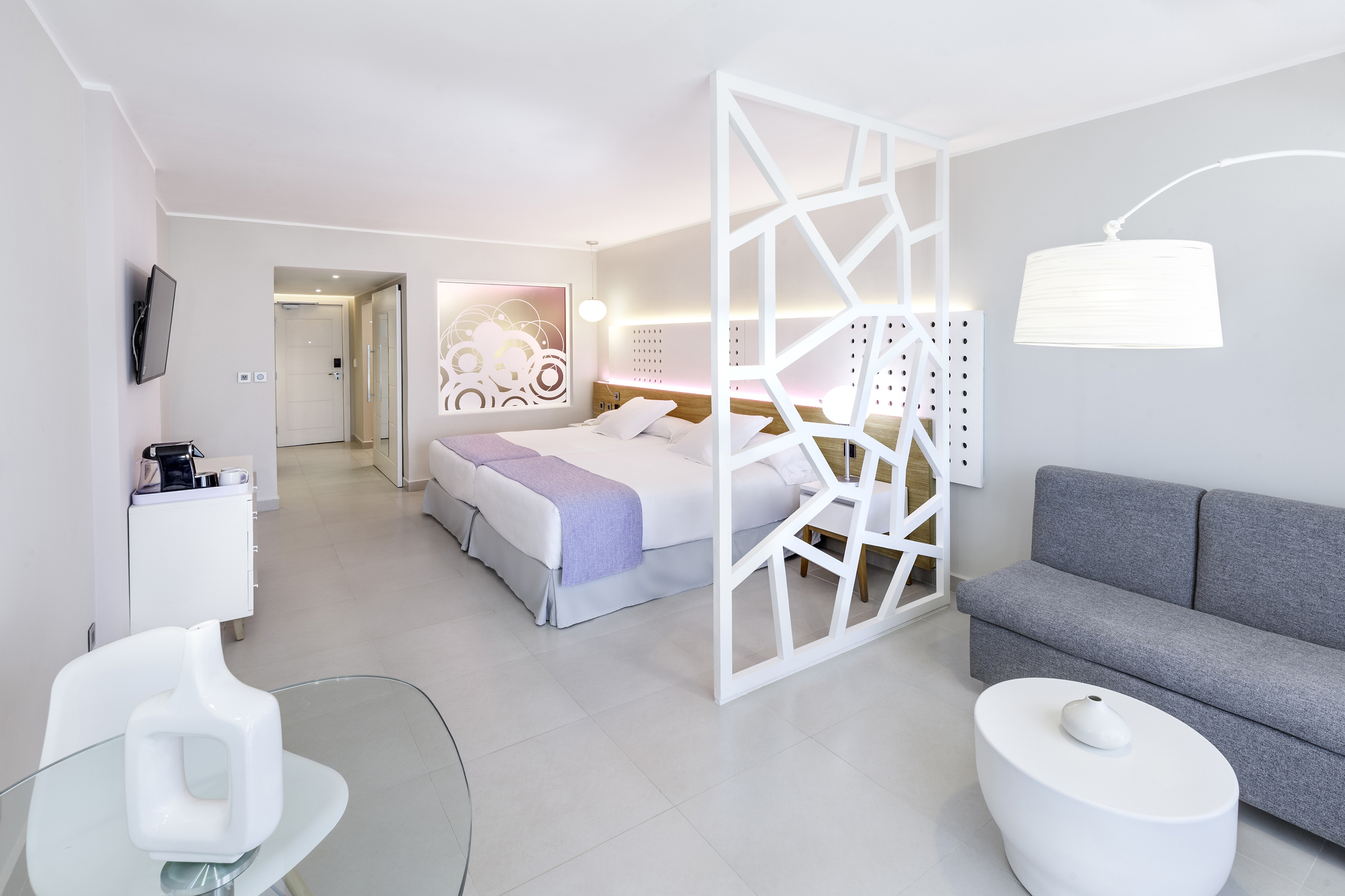 a room with a bed and a couch