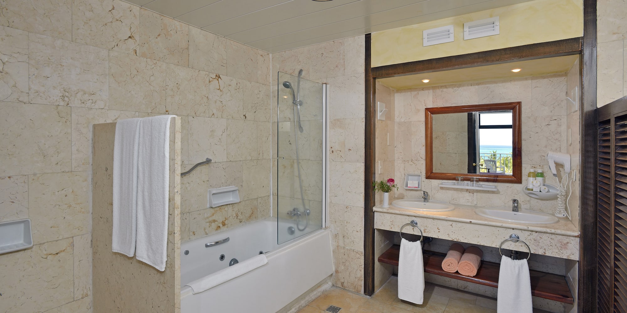 a bathroom with a bathtub and sink