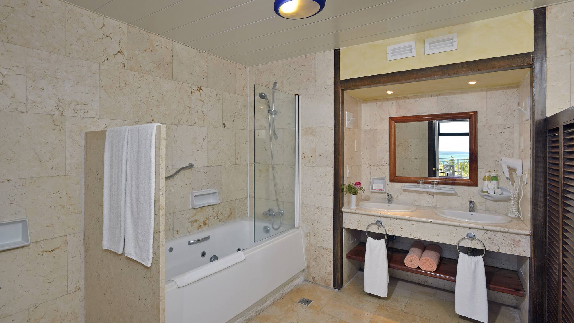 a bathroom with a bathtub and sink