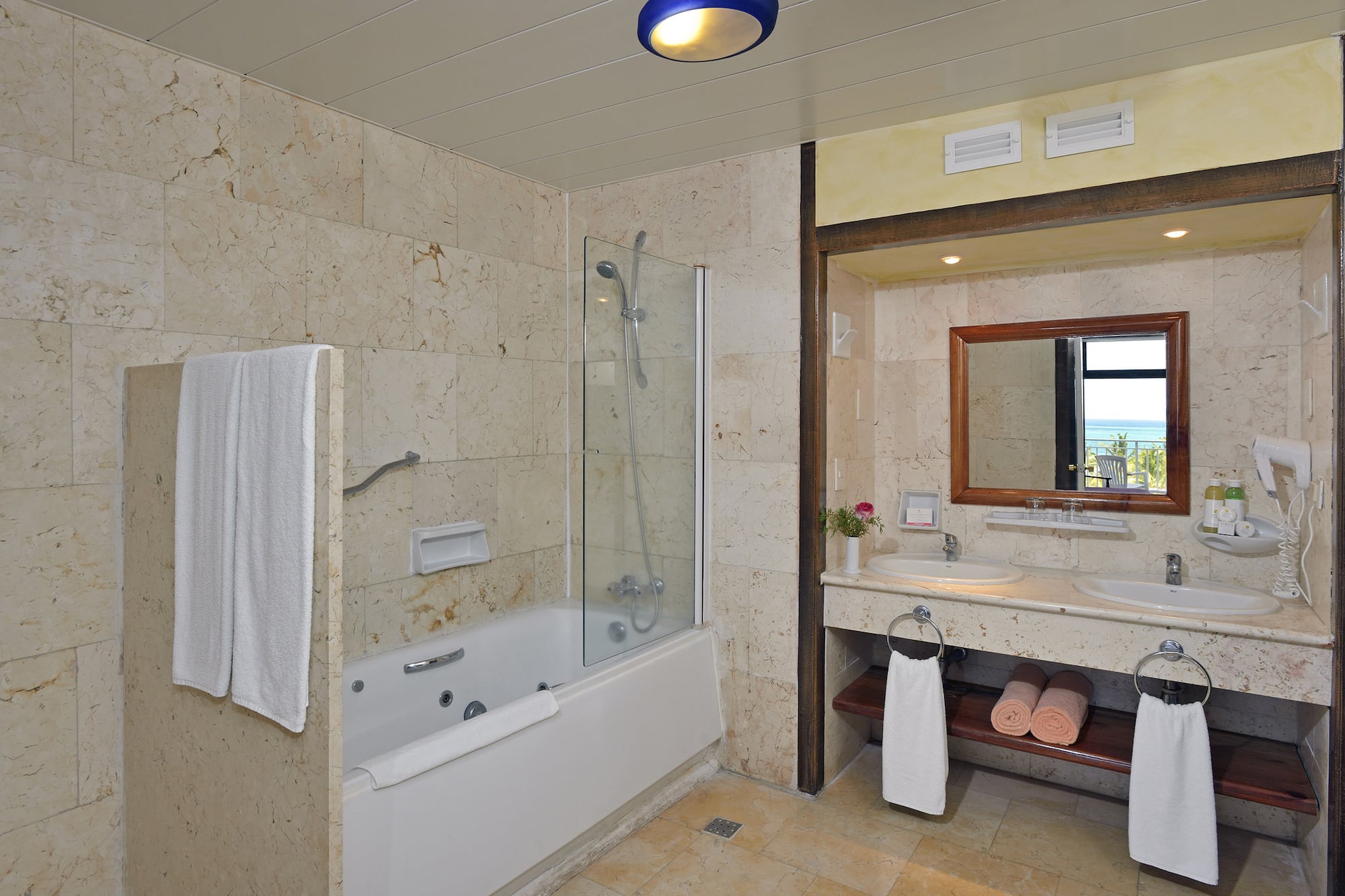 a bathroom with a bathtub and sink