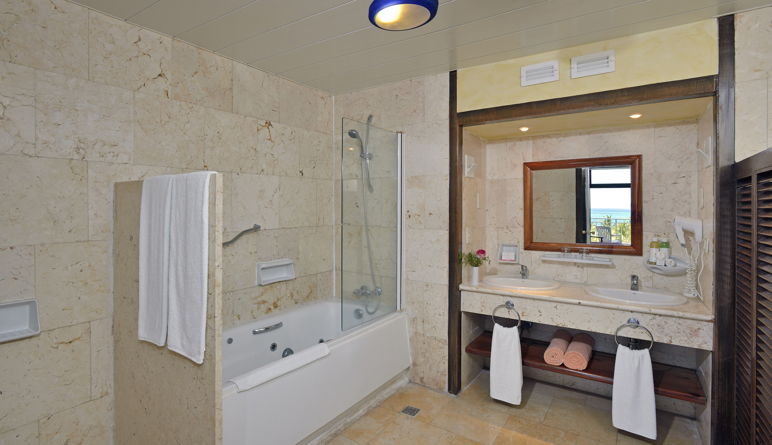 a bathroom with a bathtub and sink