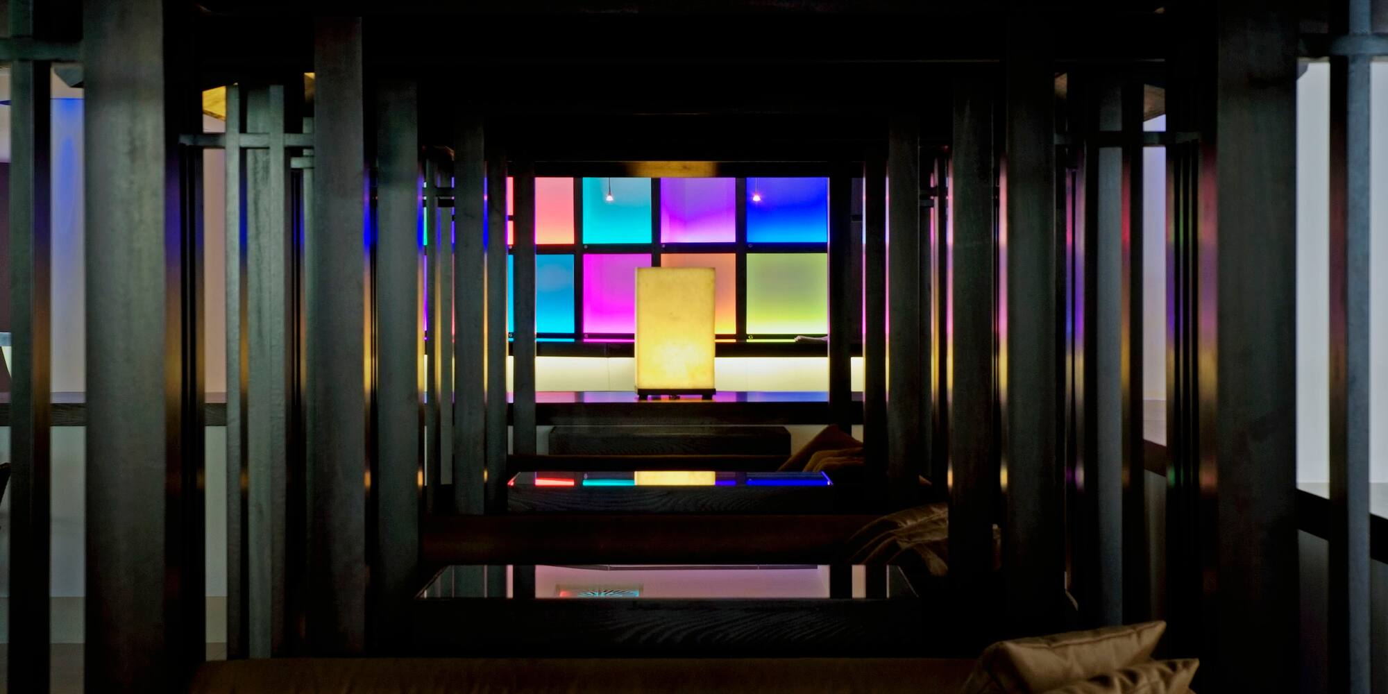 a room with colorful windows