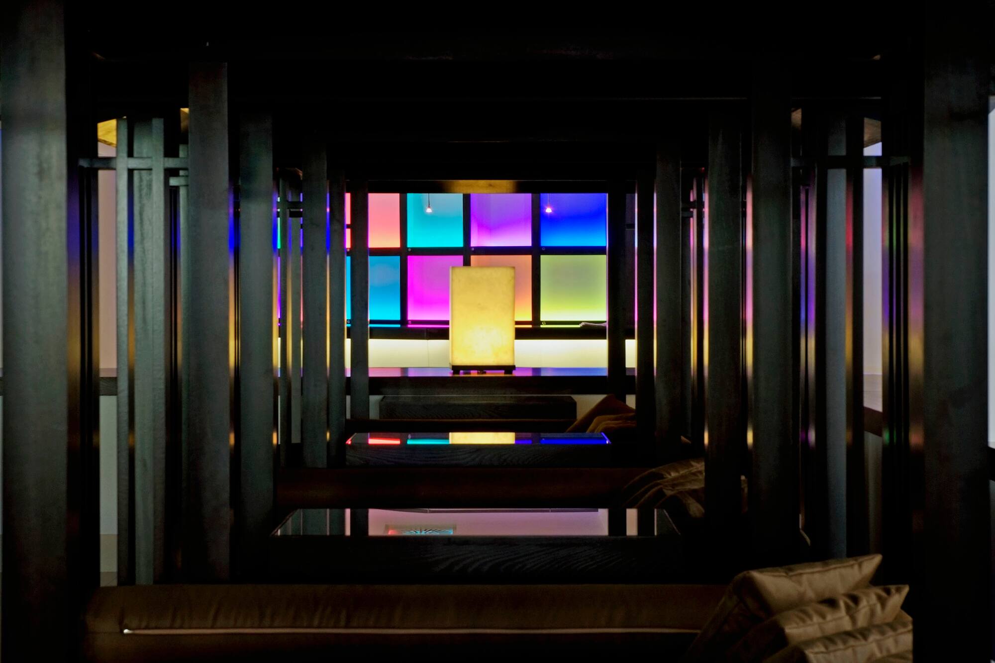 a room with colorful windows