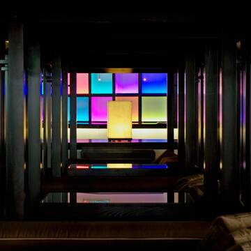 a room with colorful windows