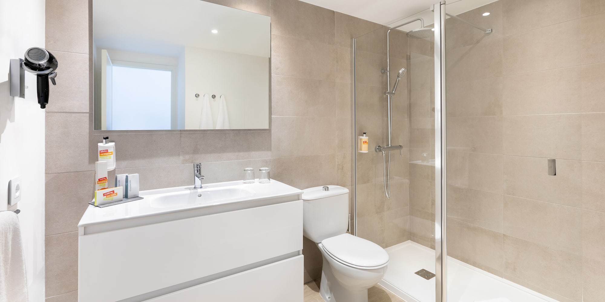 a bathroom with a shower and toilet