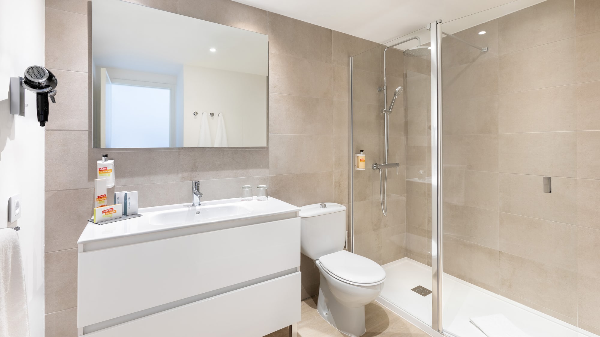 a bathroom with a shower and toilet