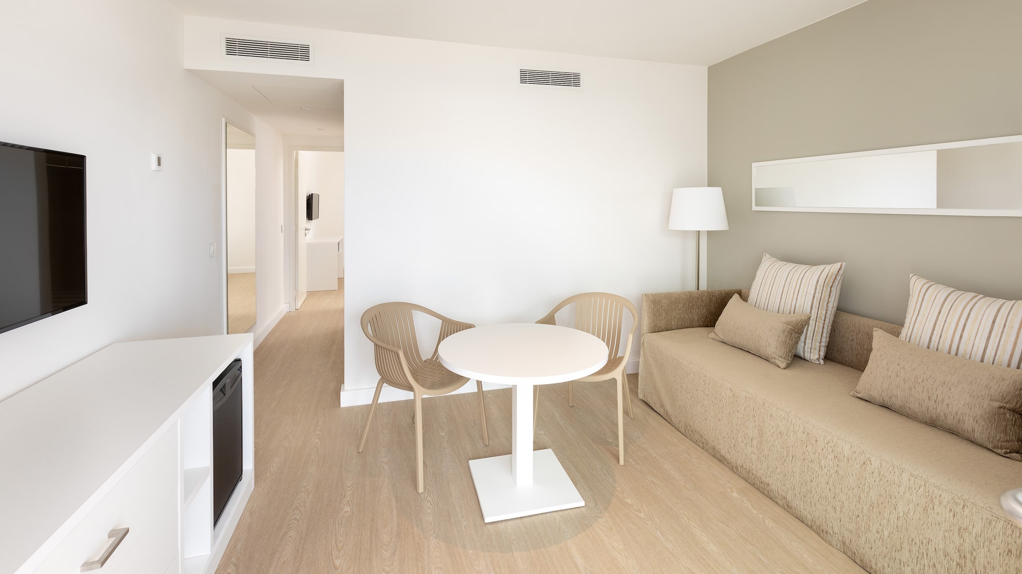 a room with a table and chairs