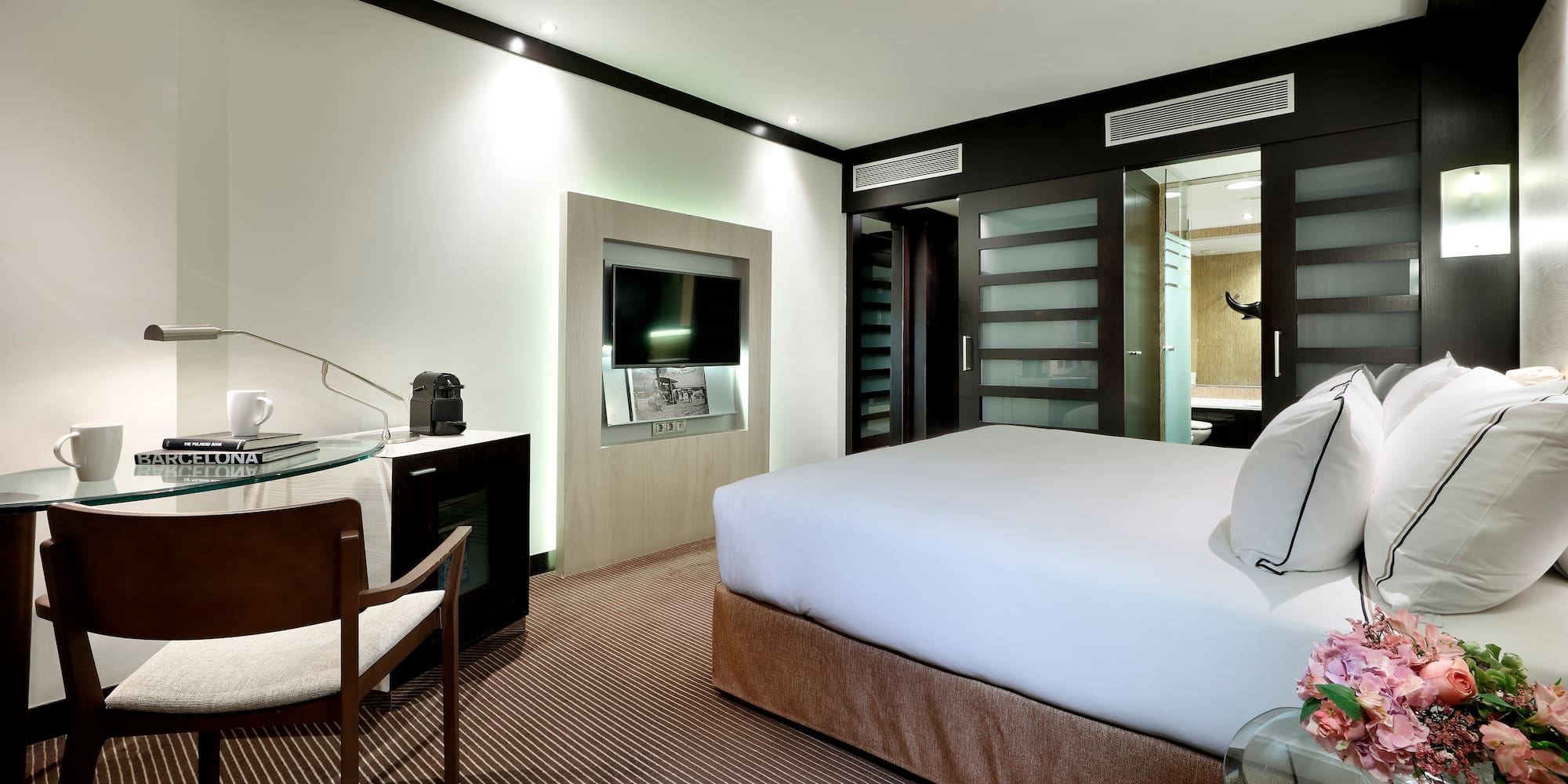 a room with a bed and a table