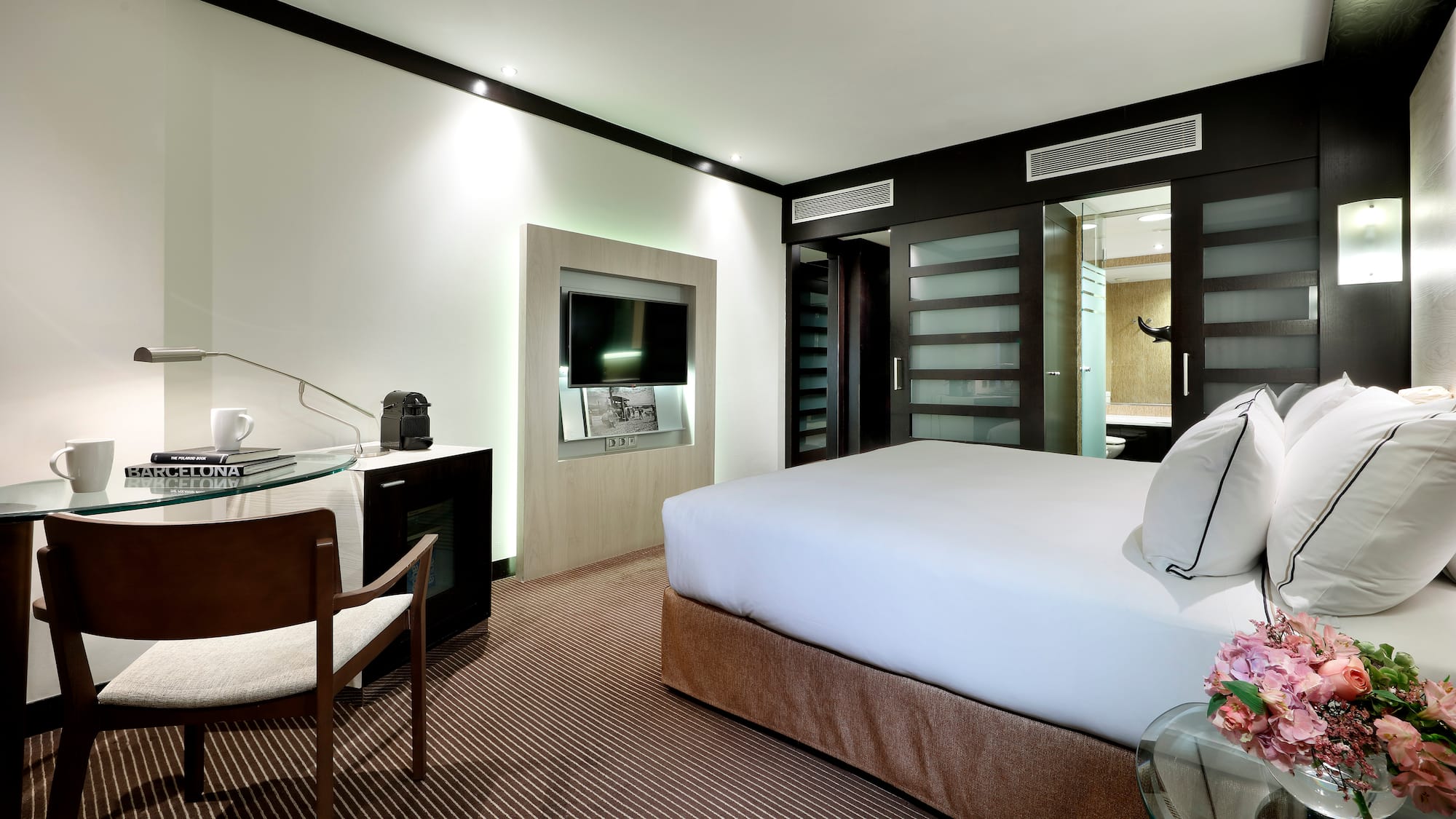 a room with a bed and a table