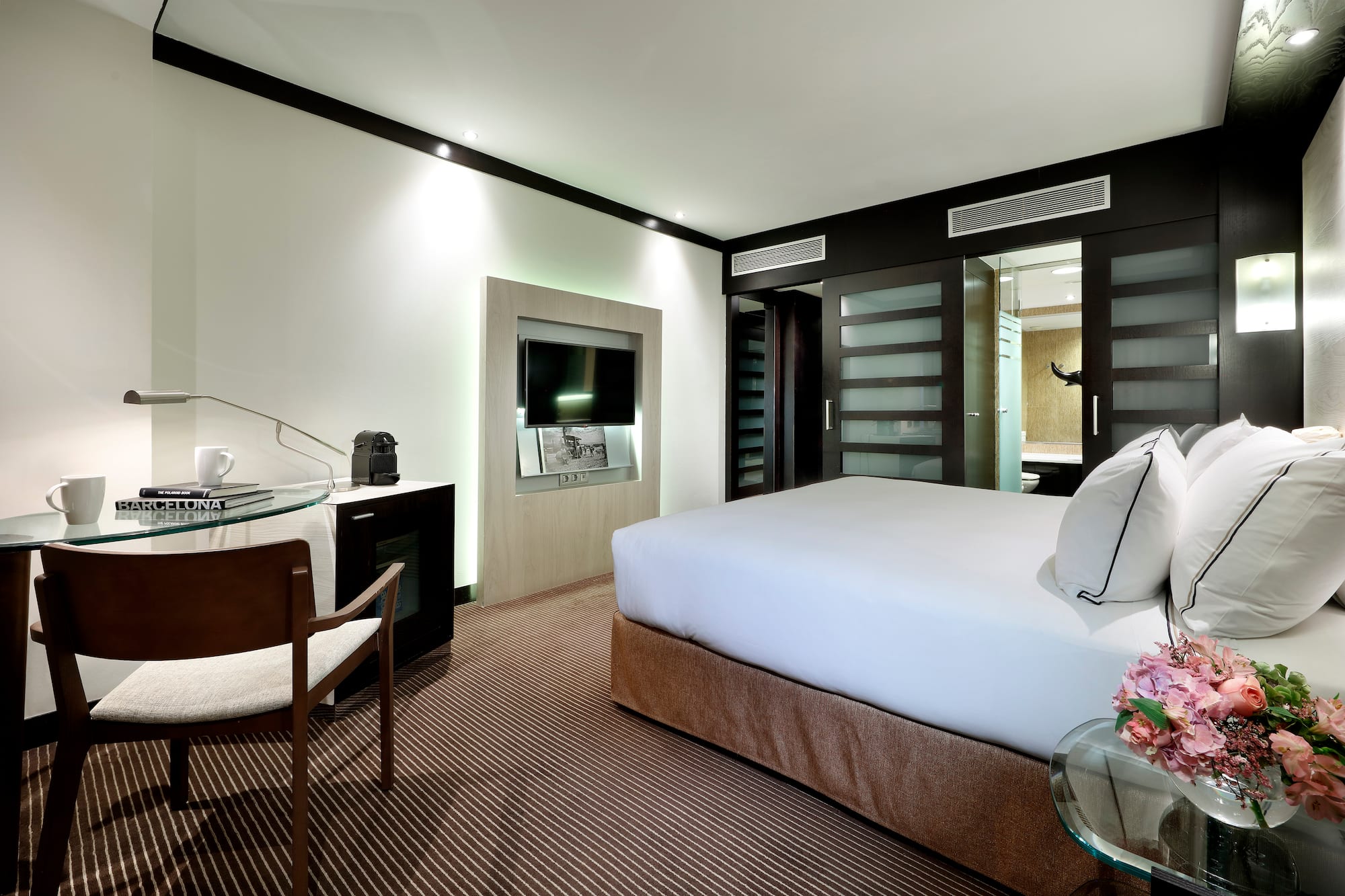 a room with a bed and a table