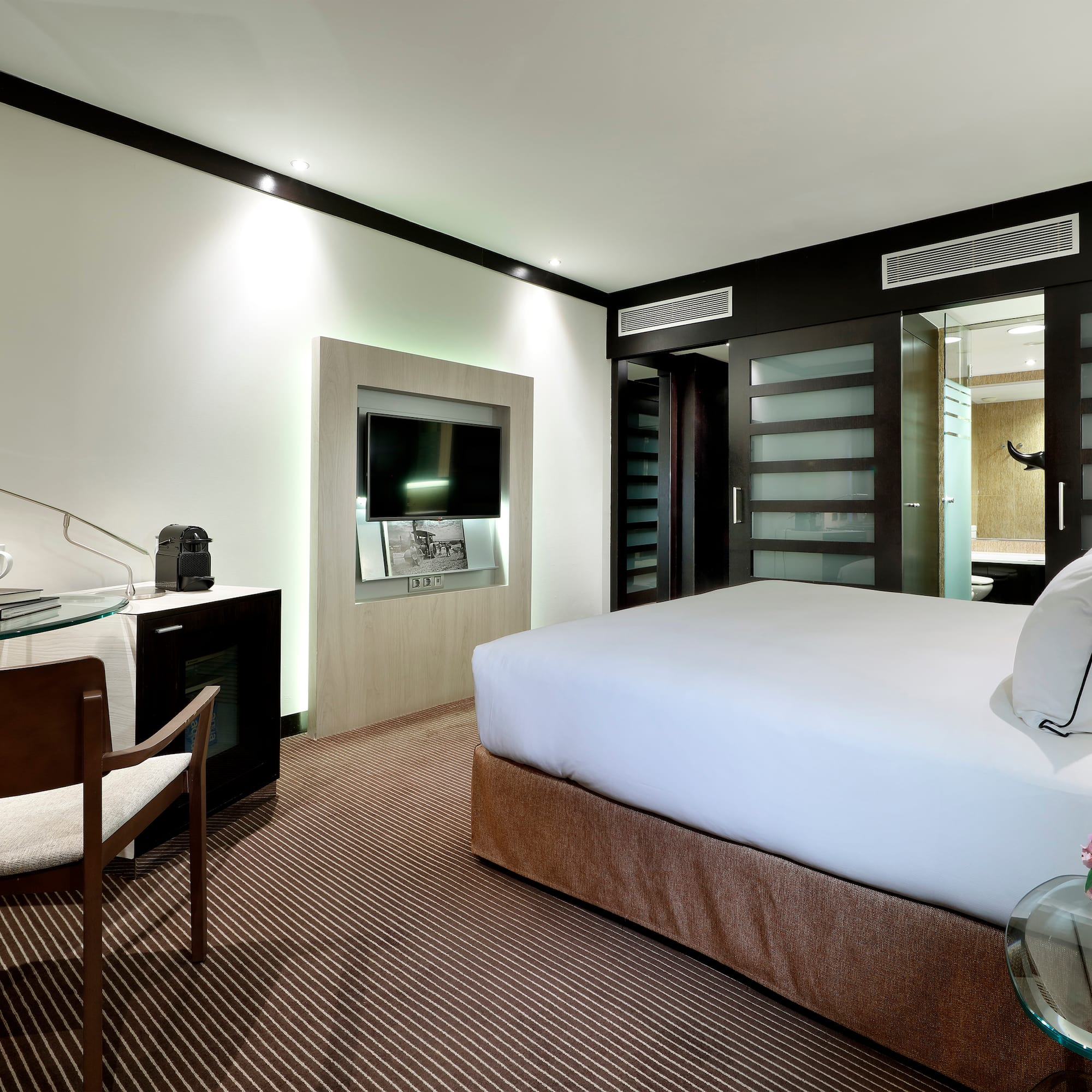 a room with a bed and a table