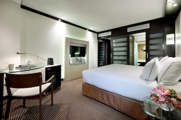 a room with a bed and a table