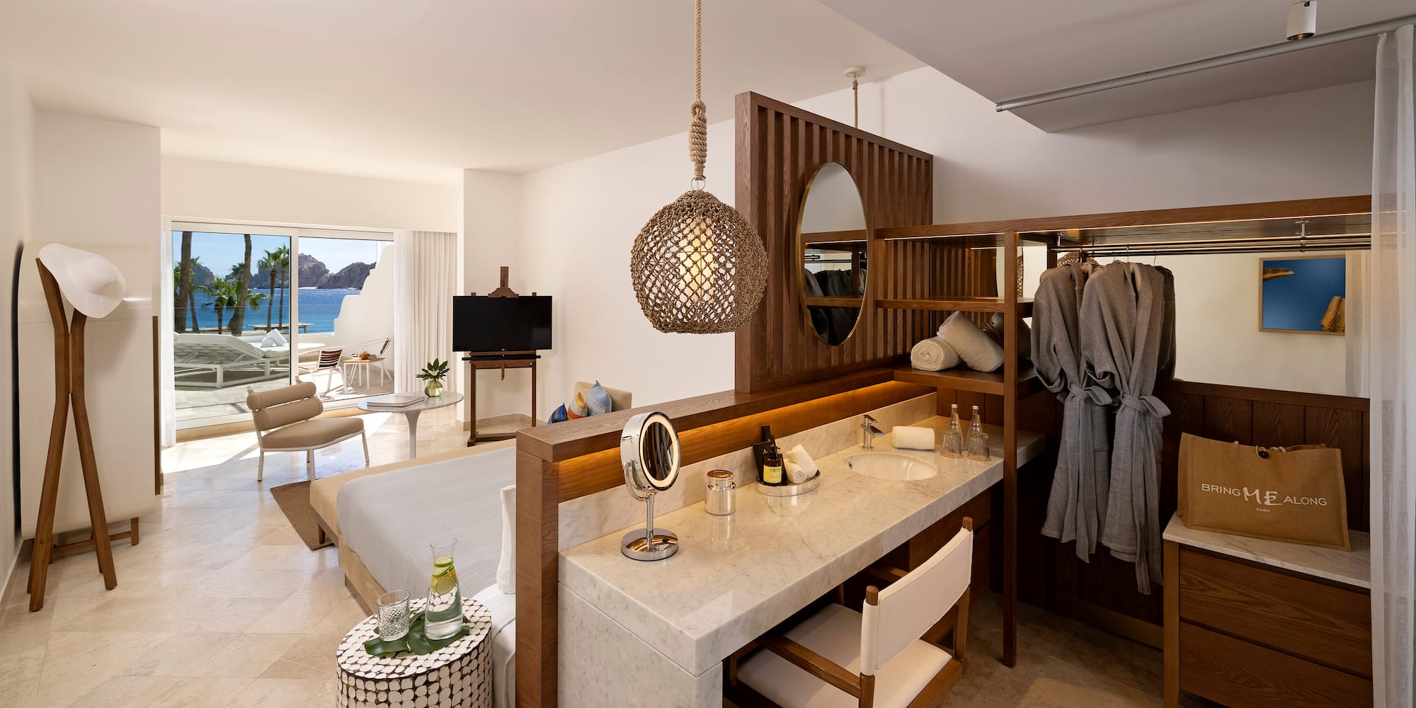 a room with a bed and a mirror