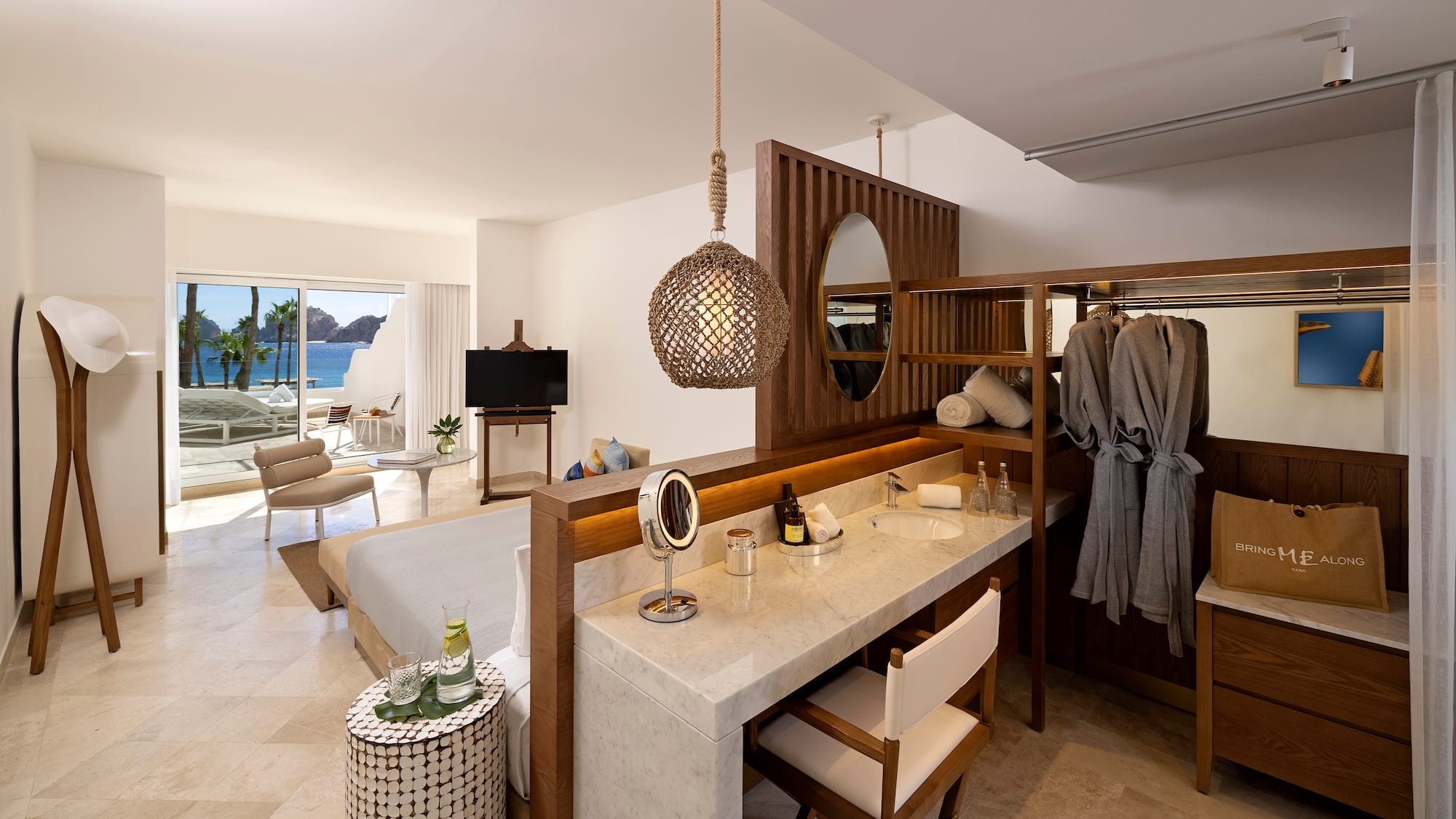 a room with a bed and a mirror