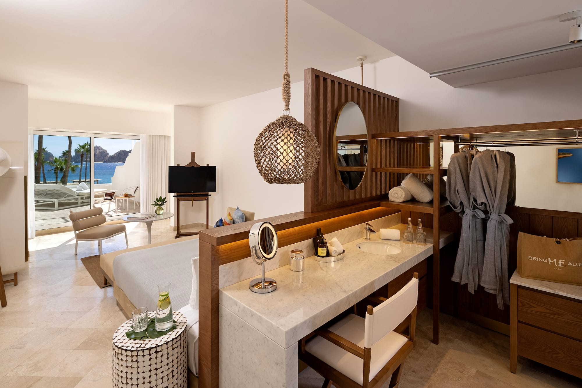 a room with a bed and a mirror