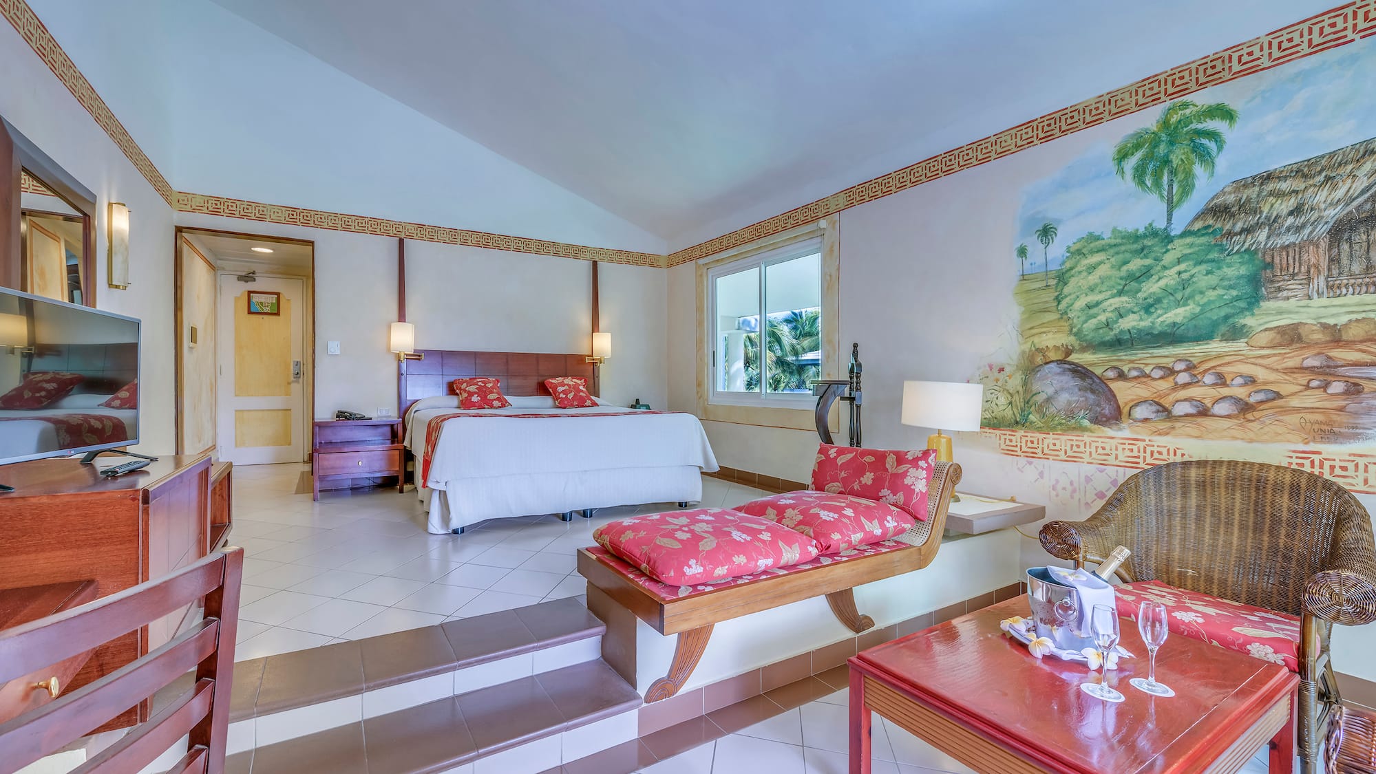 a bedroom with a bed and a table