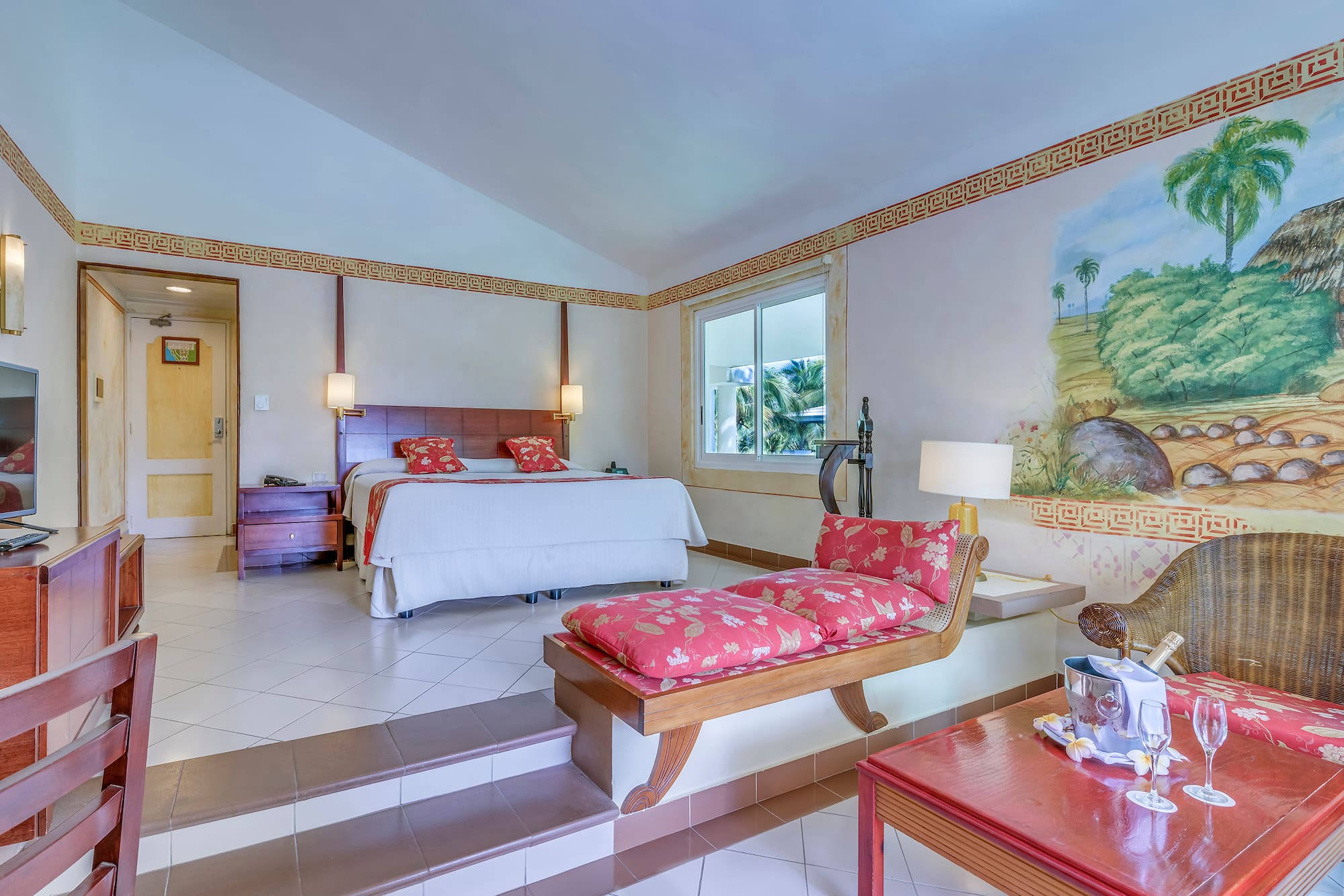 a bedroom with a bed and a table