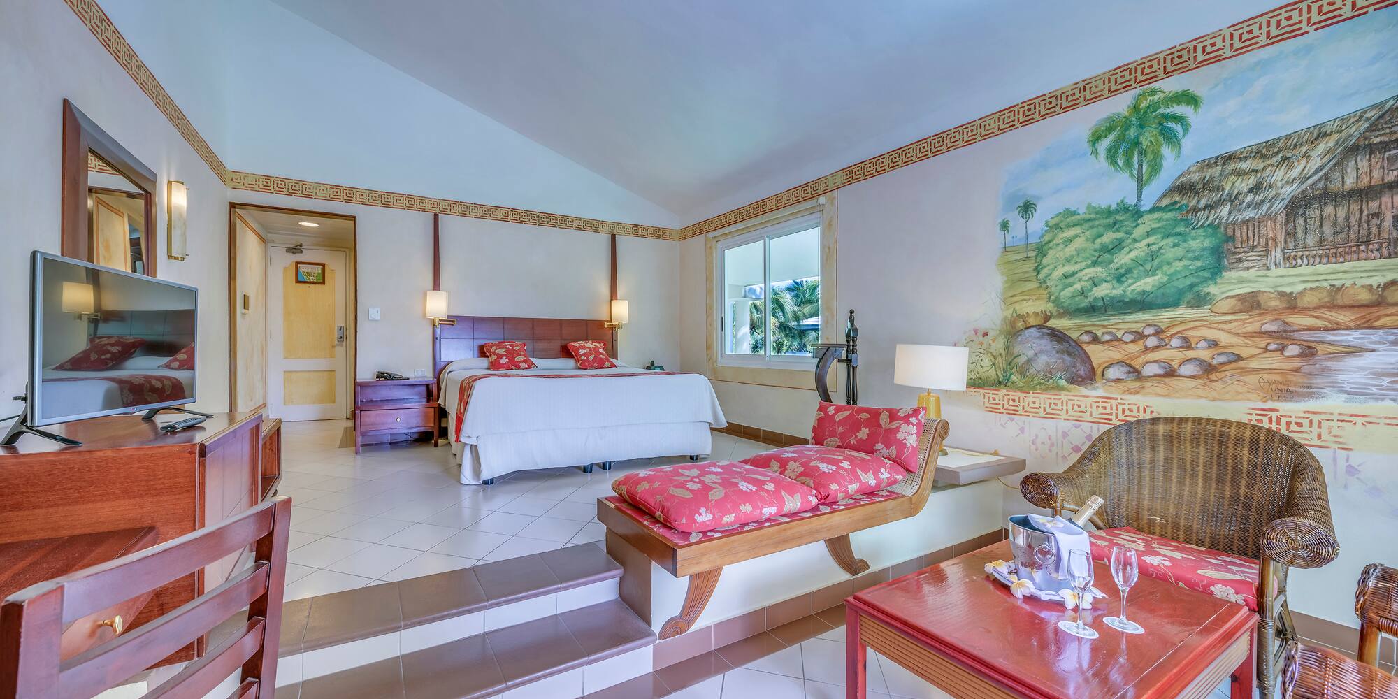 a bedroom with a bed and a table