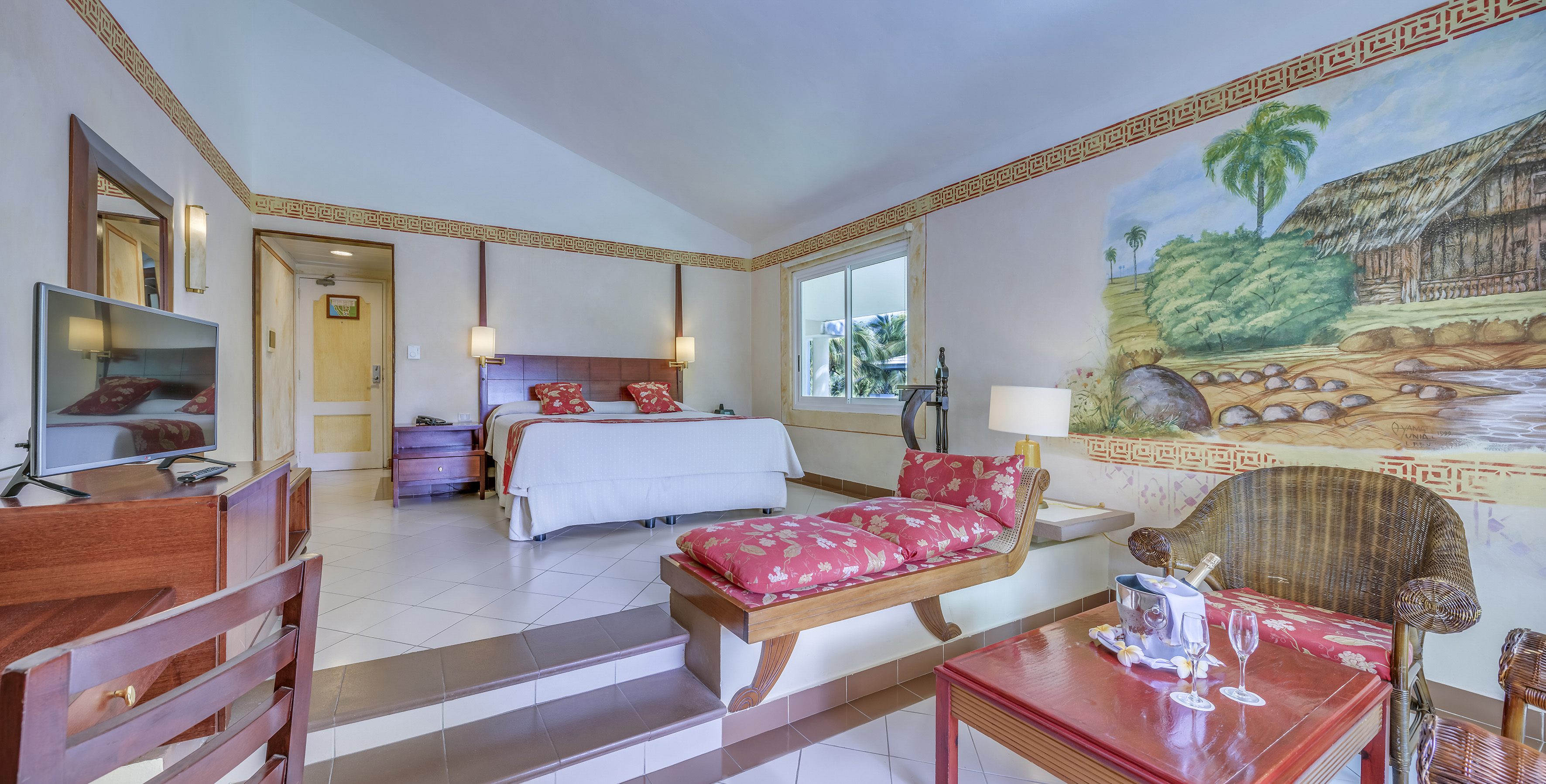 a bedroom with a bed and a table