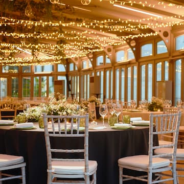 a room with tables and chairs