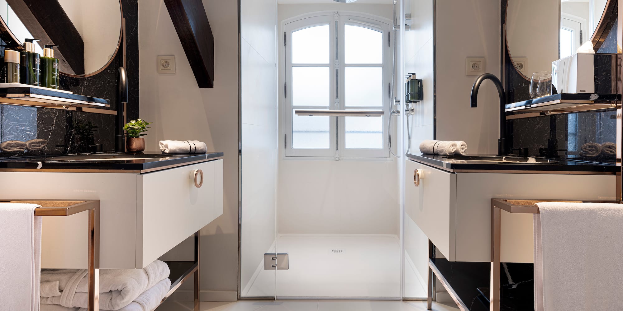 a bathroom with a shower and sink