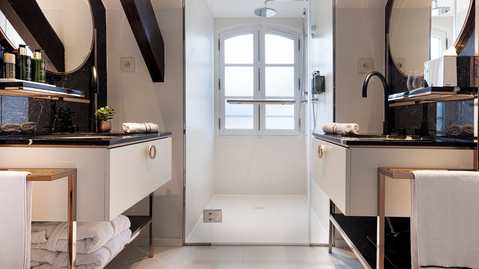 a bathroom with a shower and sink