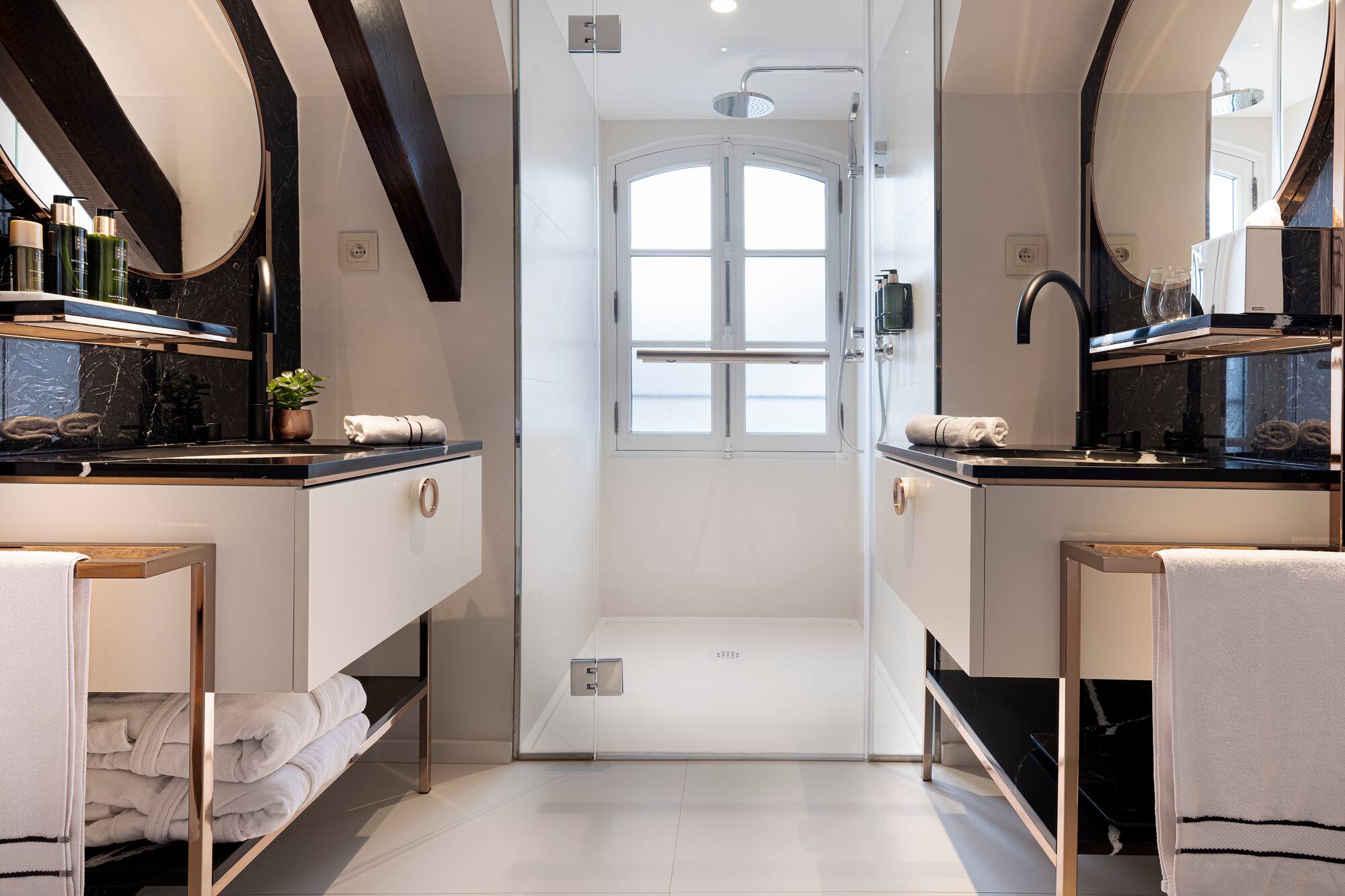 a bathroom with a shower and sink