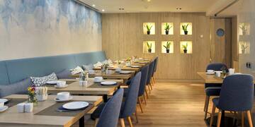 a room with tables and chairs