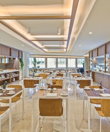 a room with tables and chairs