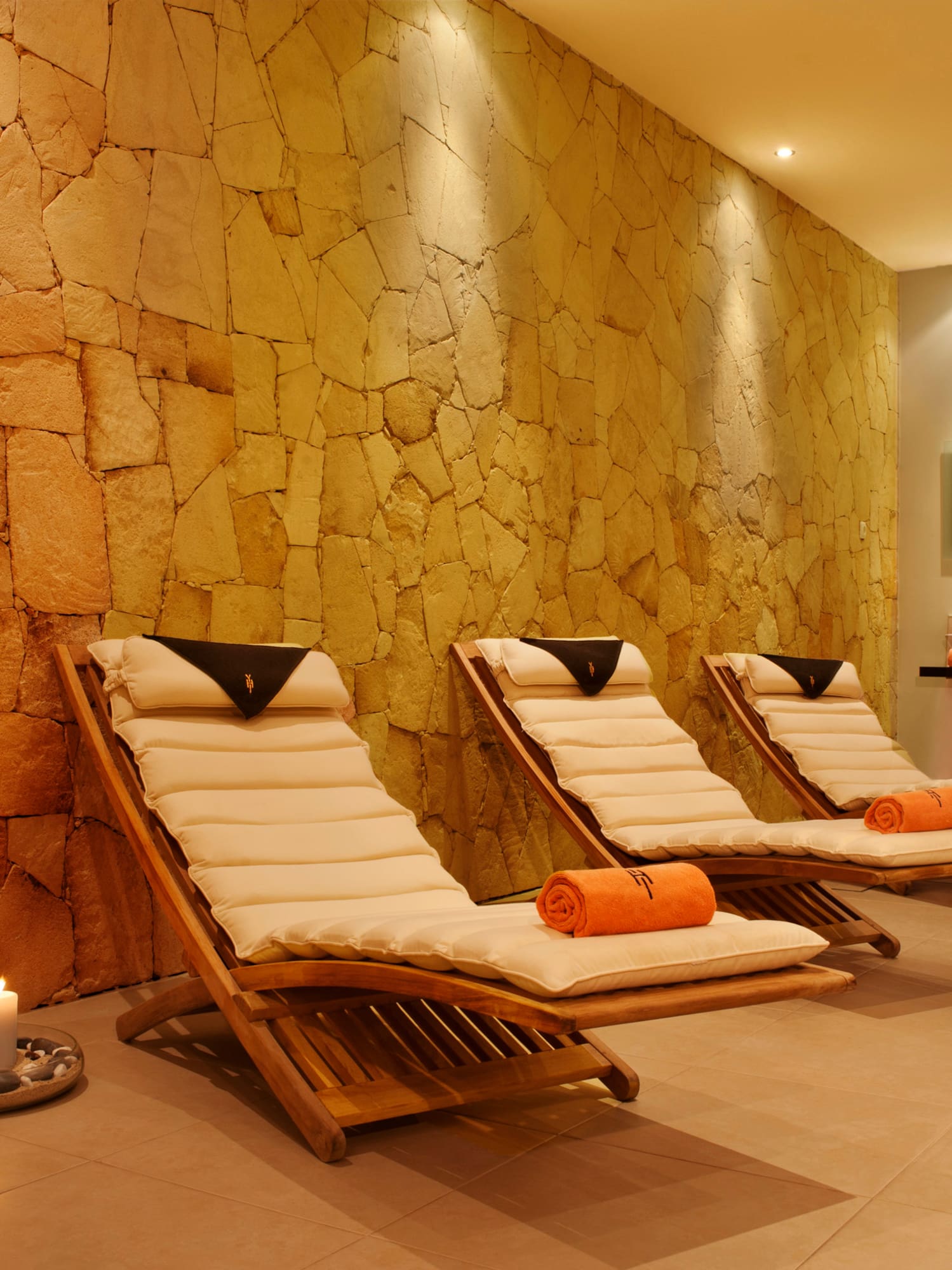 a group of lounge chairs in a room