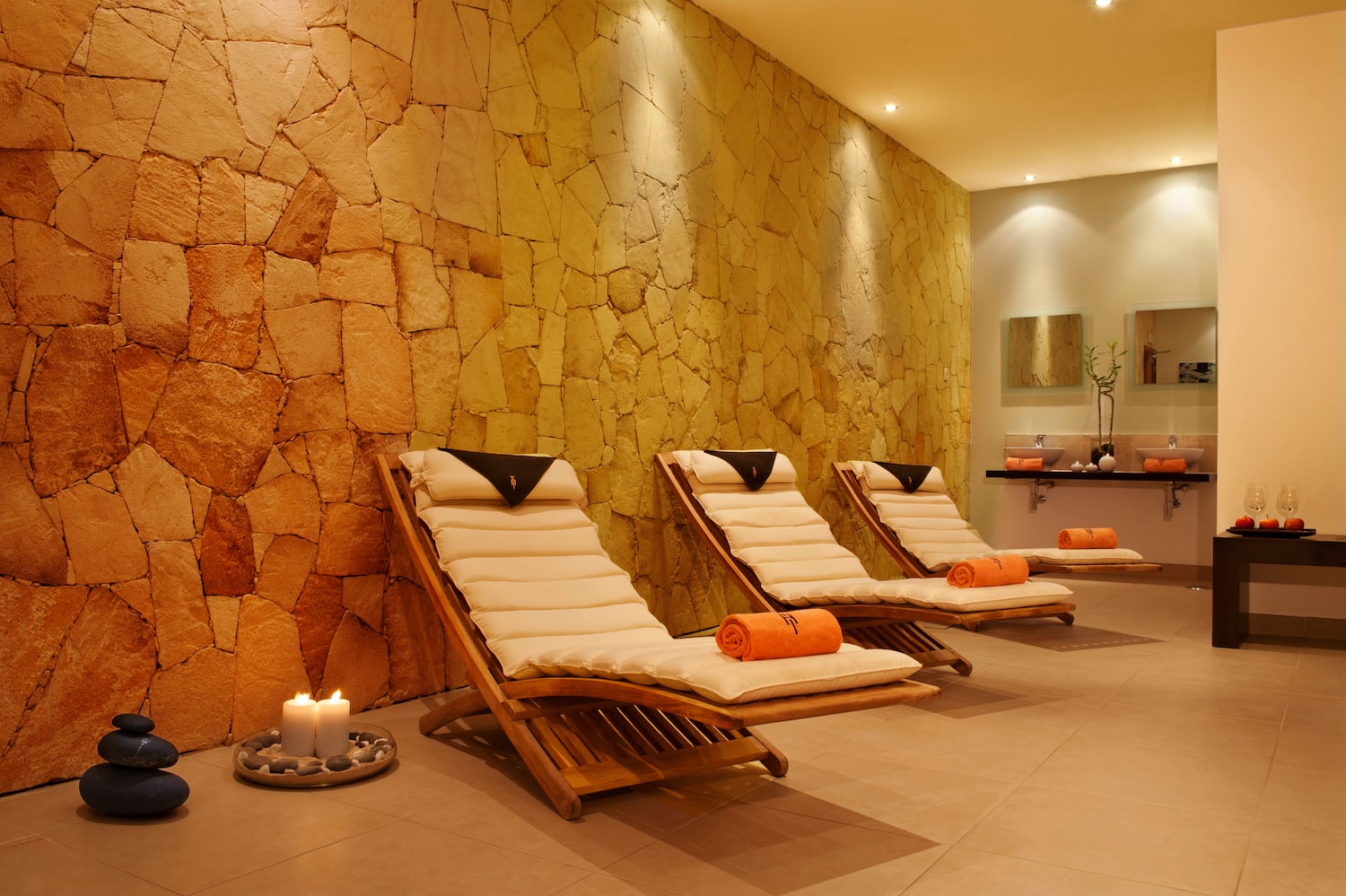 a group of lounge chairs in a room