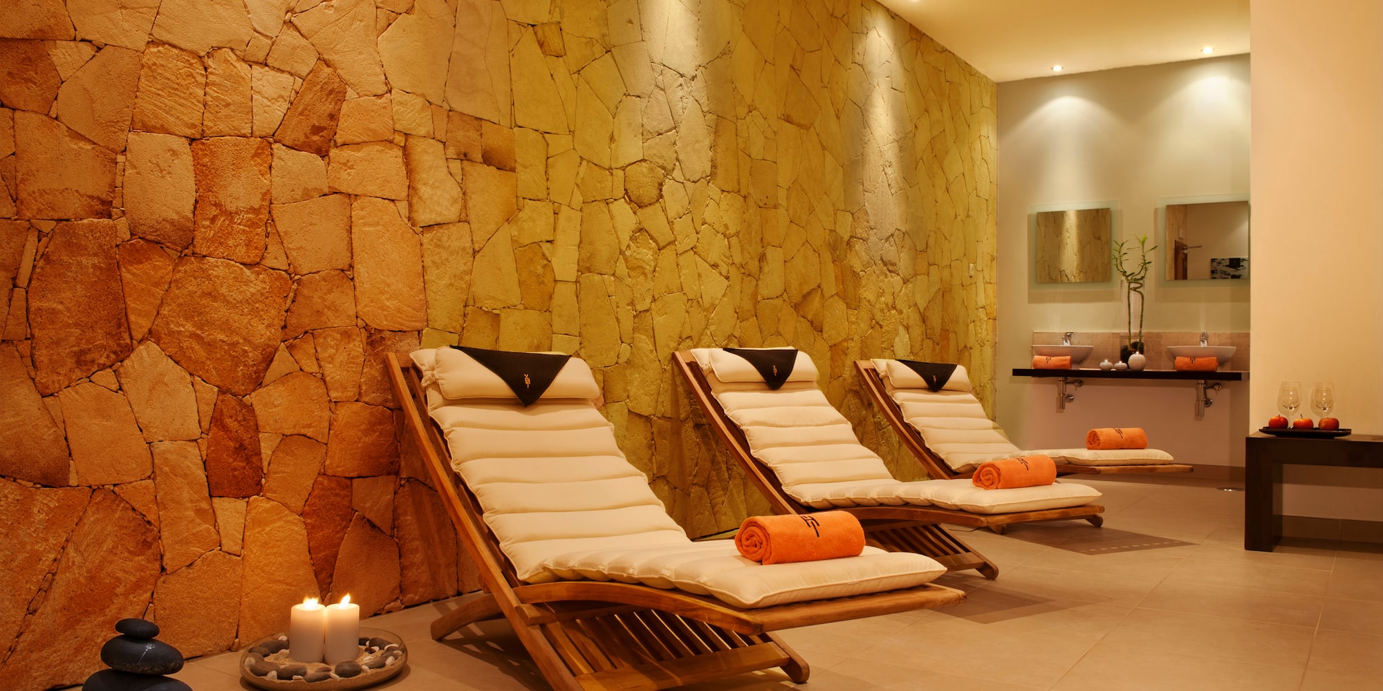 a group of lounge chairs in a room