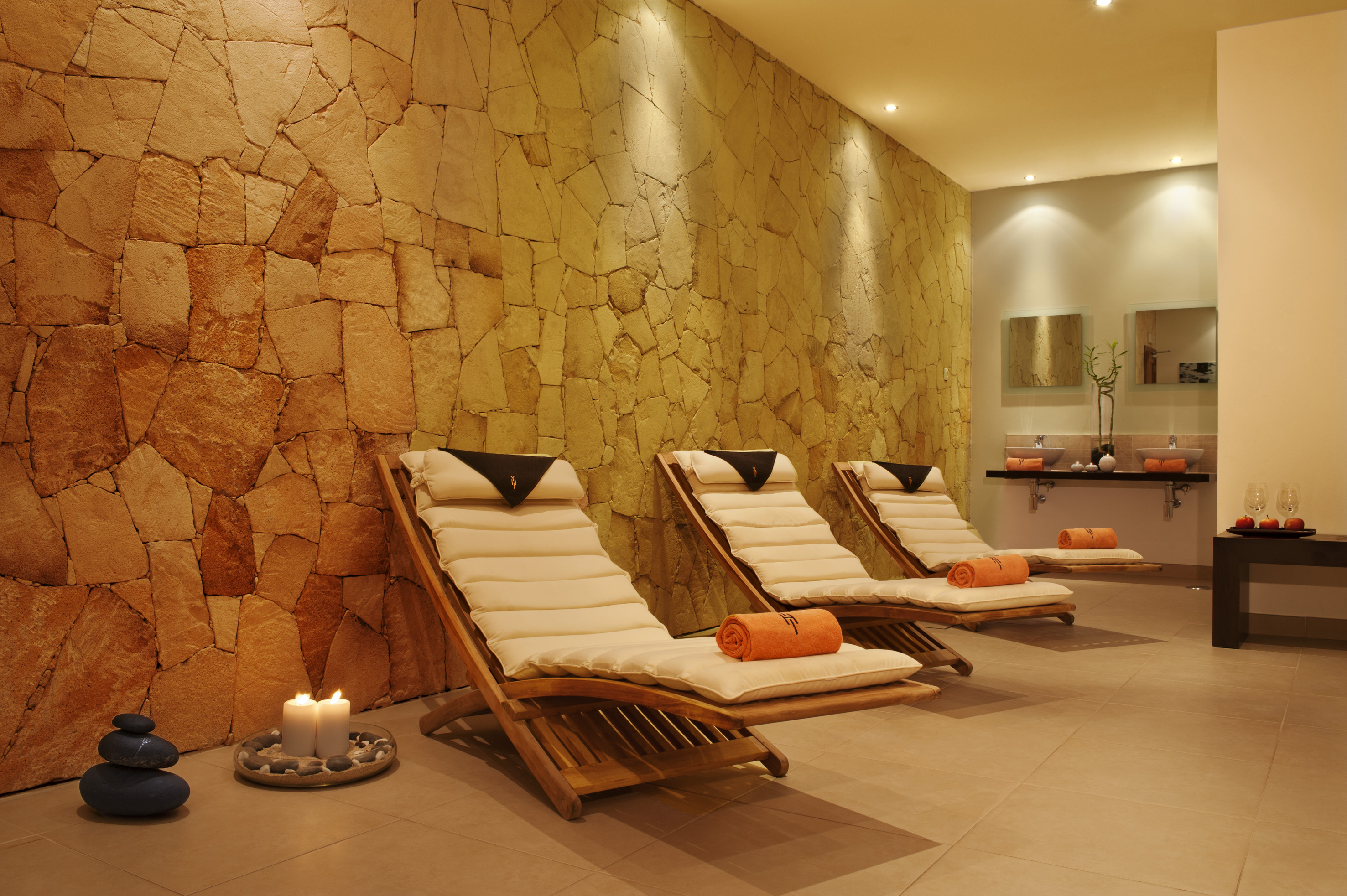 a group of lounge chairs in a room