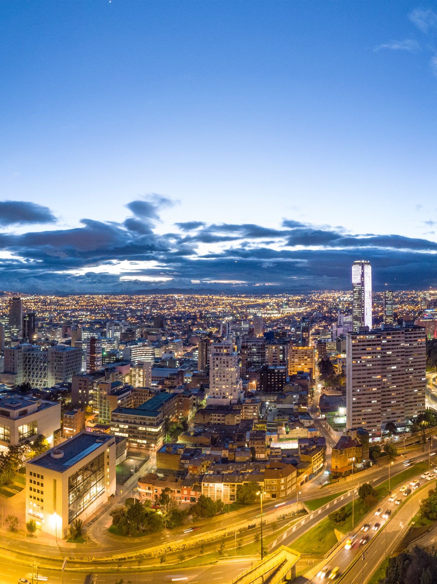 a city with lights and roads