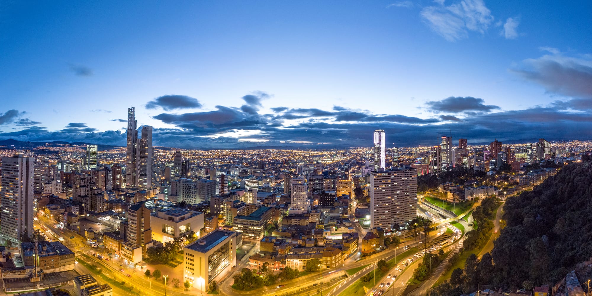 a city with lights and roads