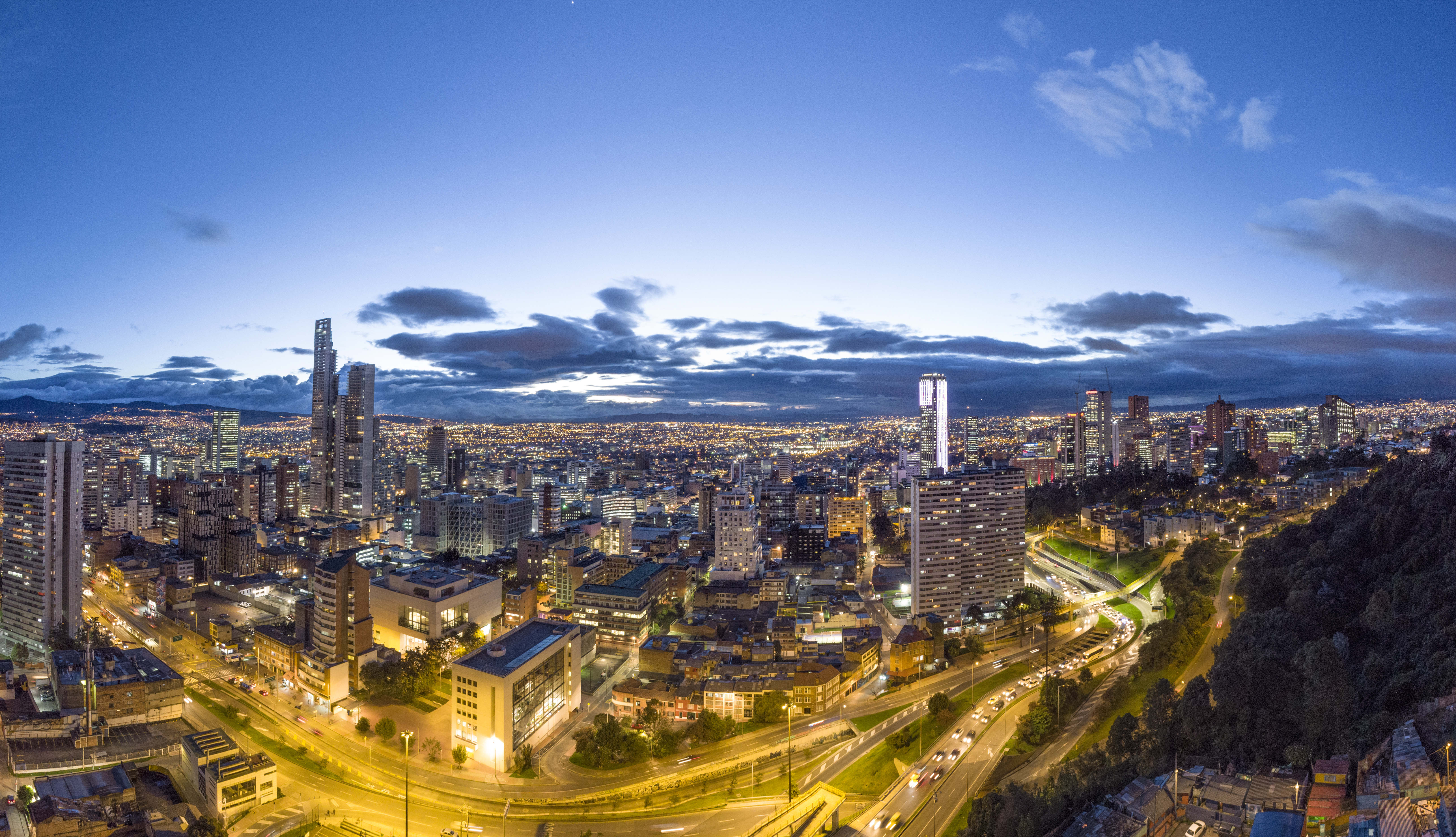 a city with lights and roads