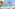 Mediterranean resort with large outdoor pool, wooden deck, and palm trees.