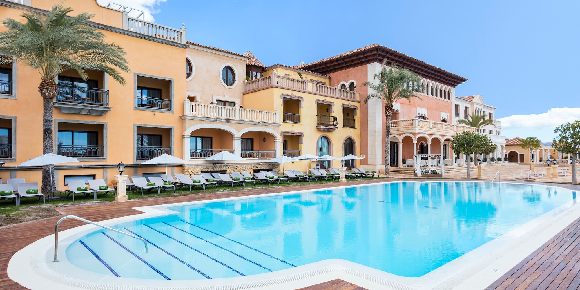 a swimming pool in front of a building