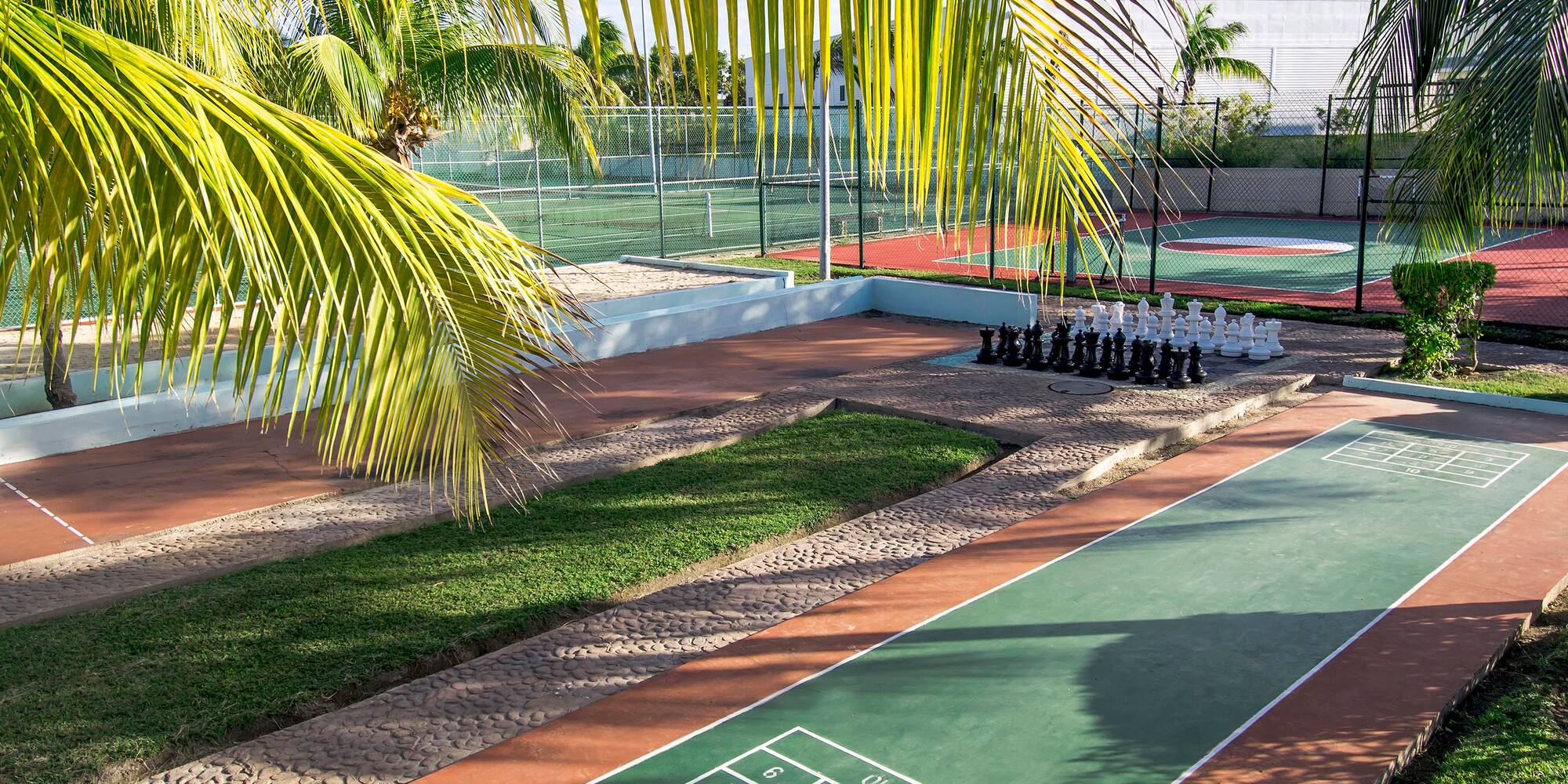 a tennis court with a game of chess