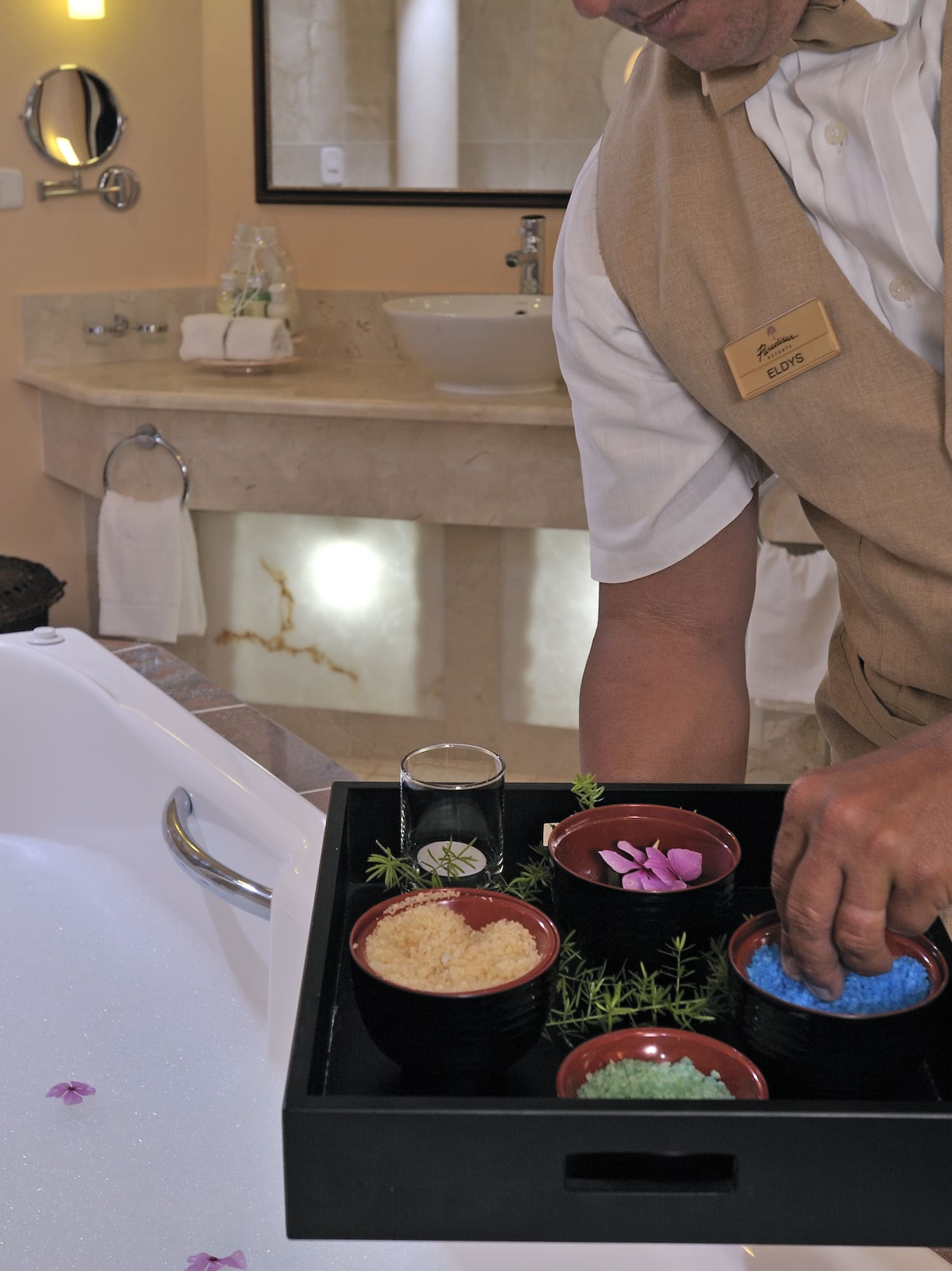 a man holding a tray of food
