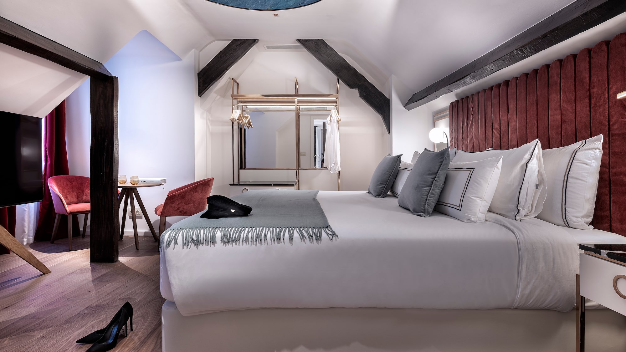 a room with a bed and a mirror