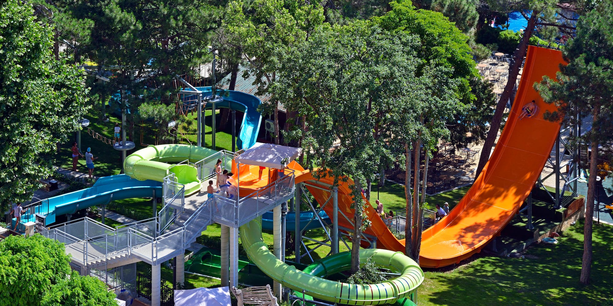 a water park with slides and trees