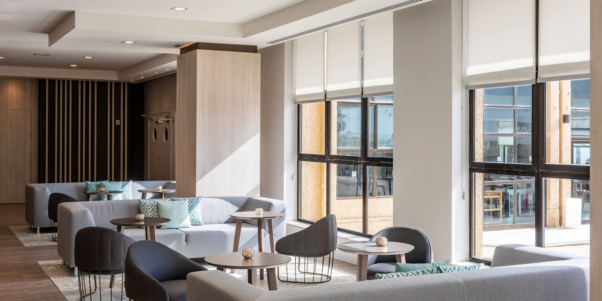 a room with couches and tables