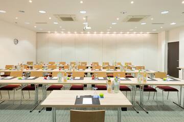 a room with tables and chairs