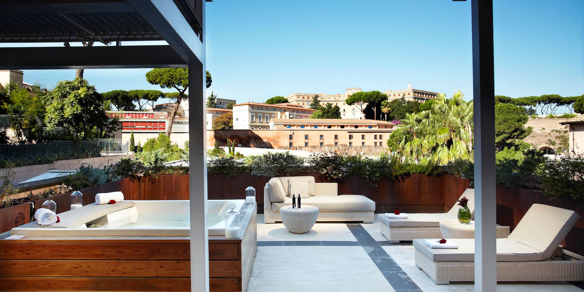 a patio with a hot tub and a jacuzzi