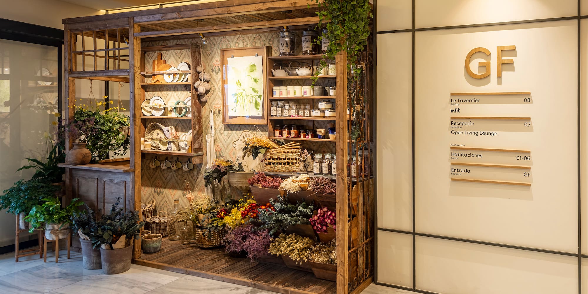 a display of flowers and plants