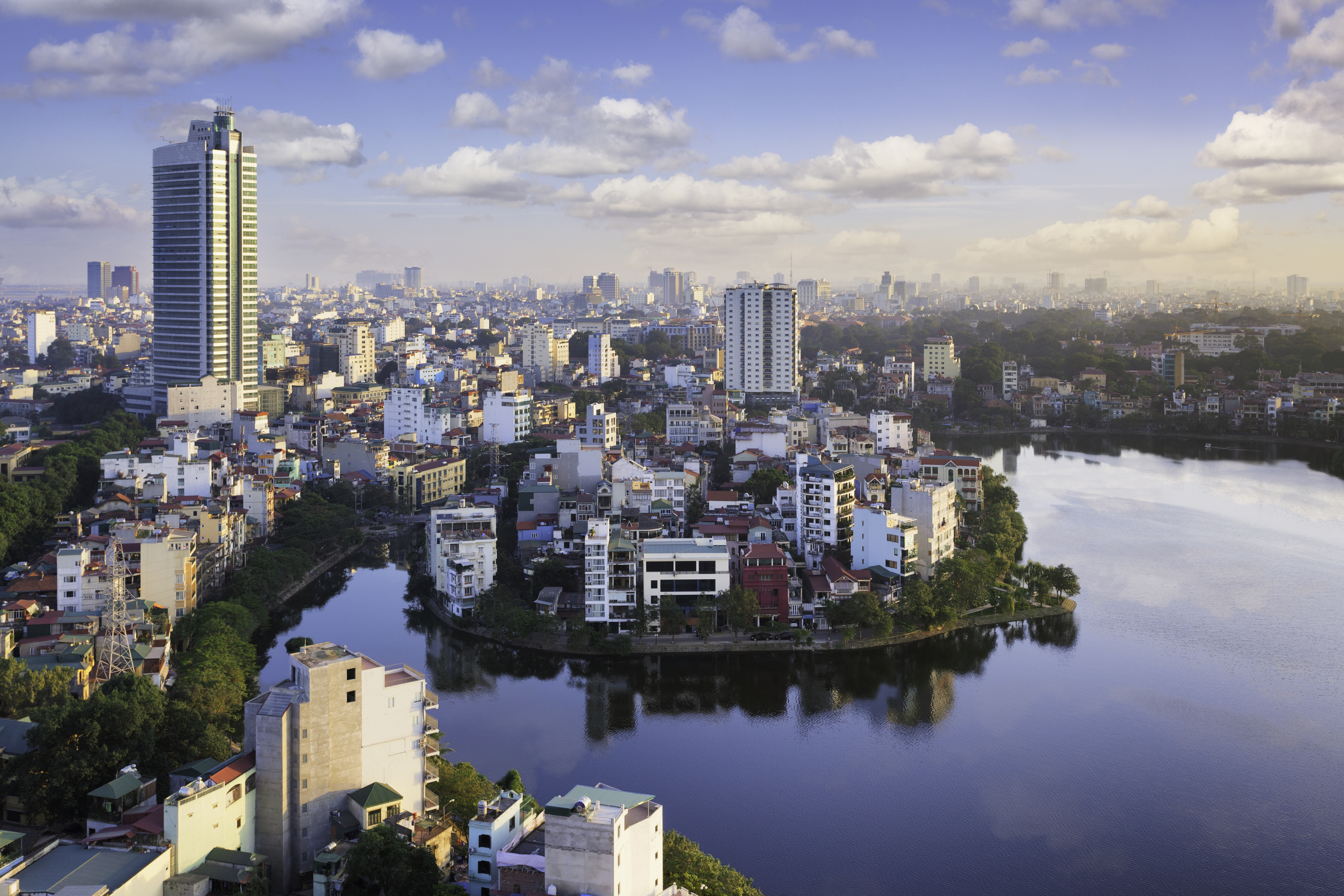 a city with buildings around a body of water