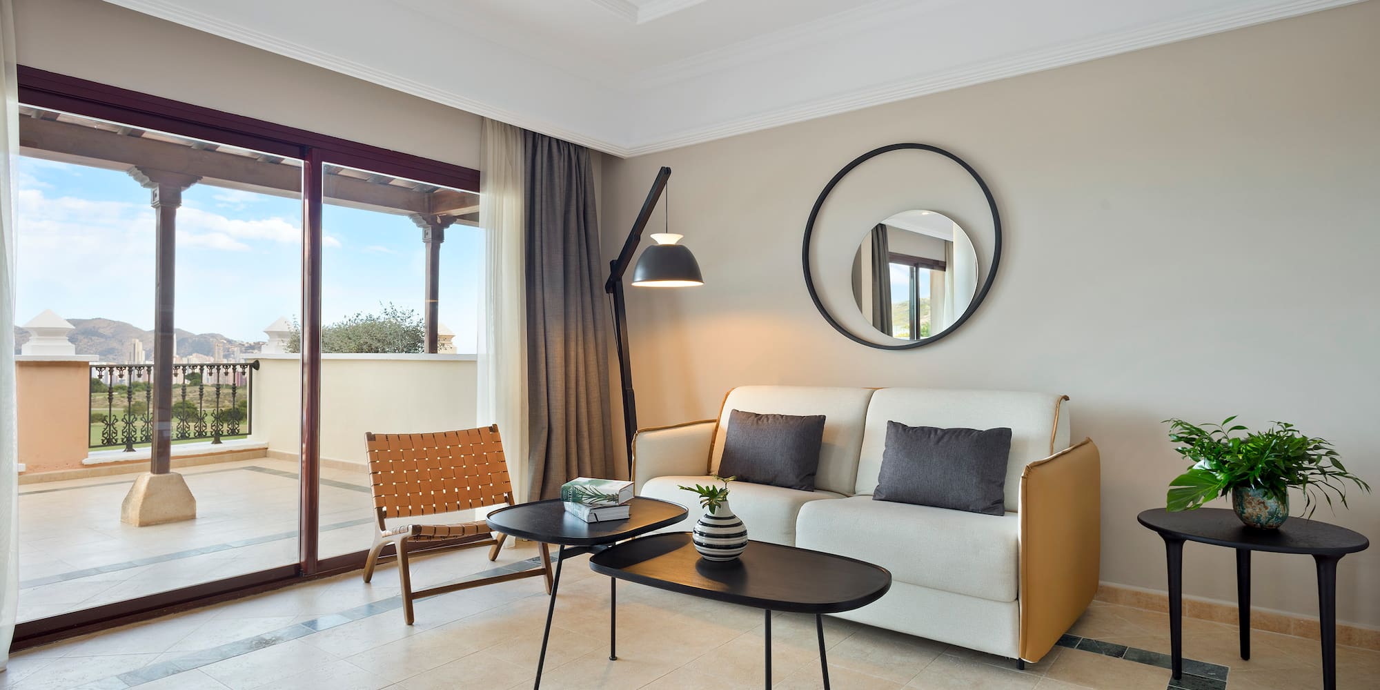 a living room with a couch and a table