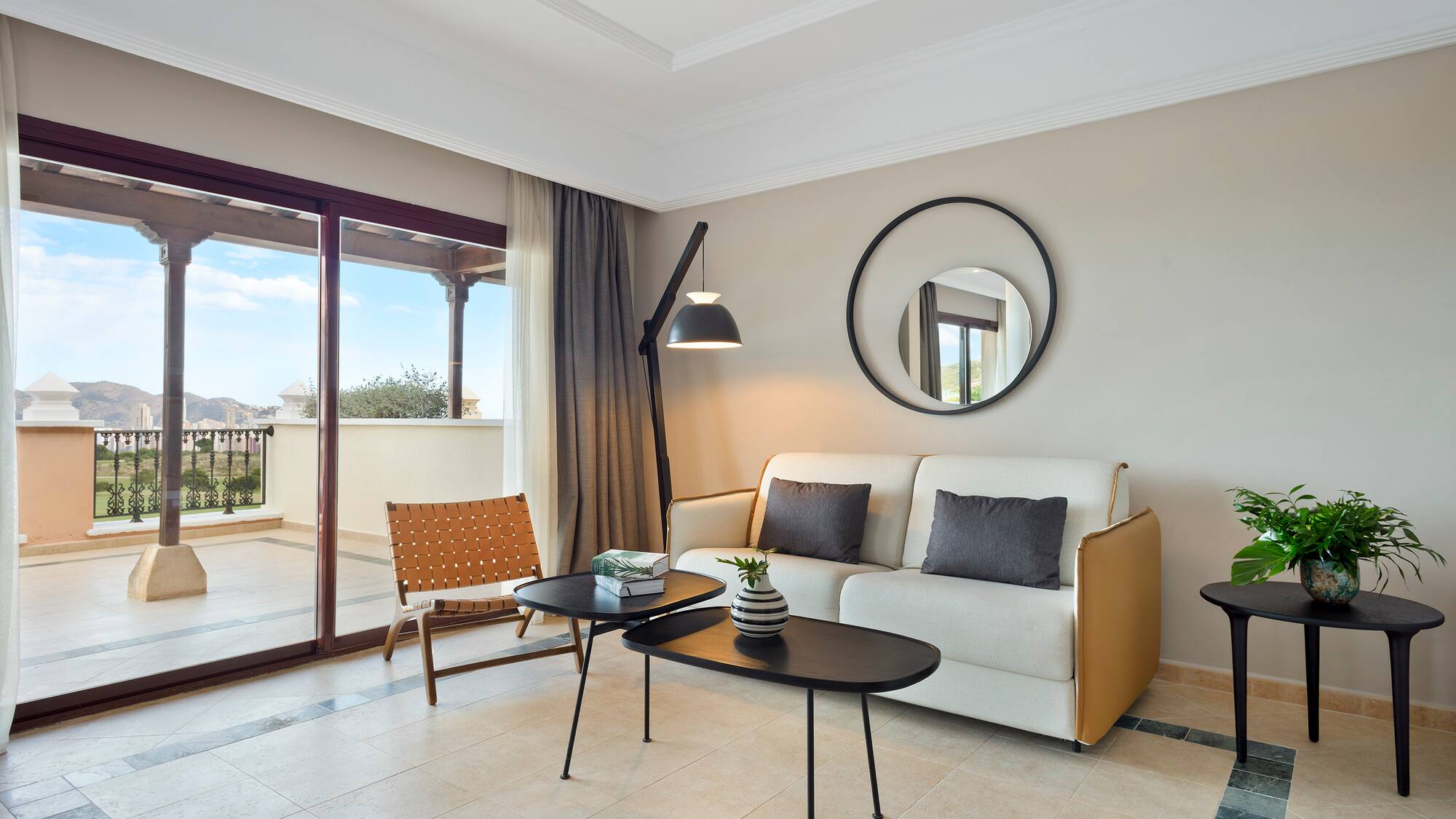 a living room with a couch and a table