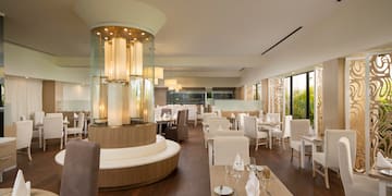 a room with tables and chairs